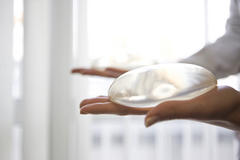 breast implants may decrease breast cancer survival rates